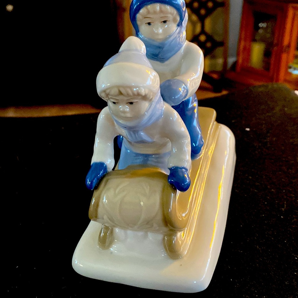 Boy /girl sledding